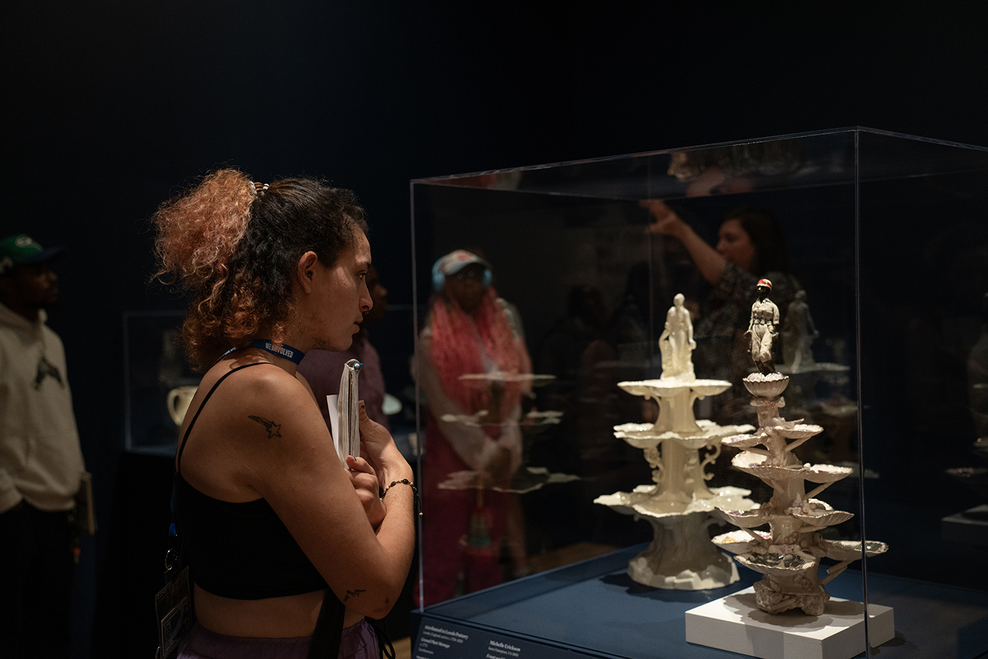 A student observes art in a special exhibit at the Baltimore Museum of Art.