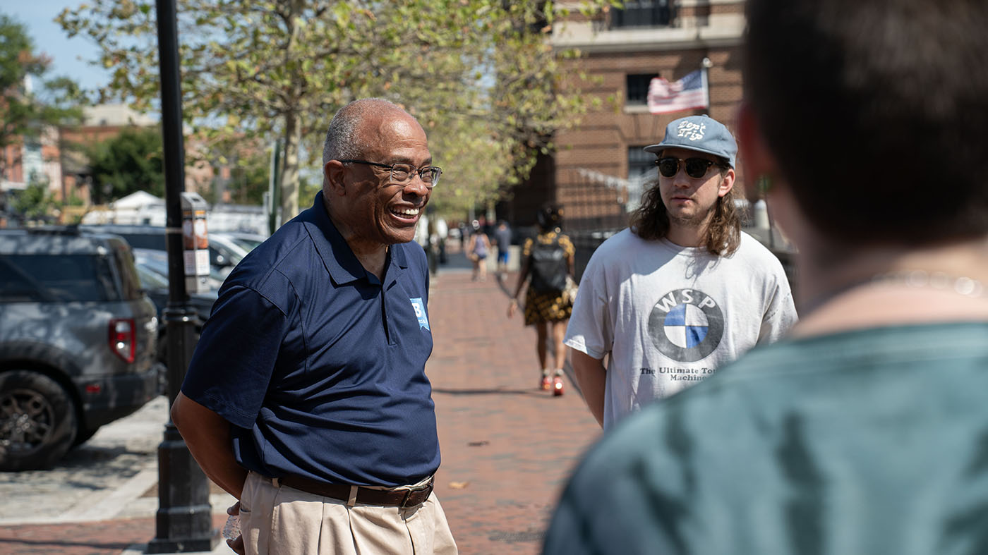 Kurt Schmoke speaks with a class of UBalt students in Fells Point.